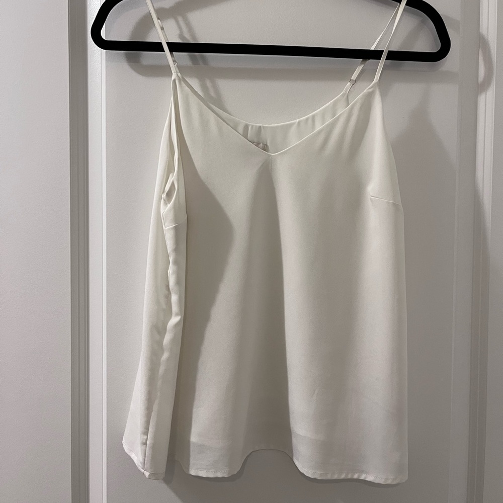 A new day tank top . Size small